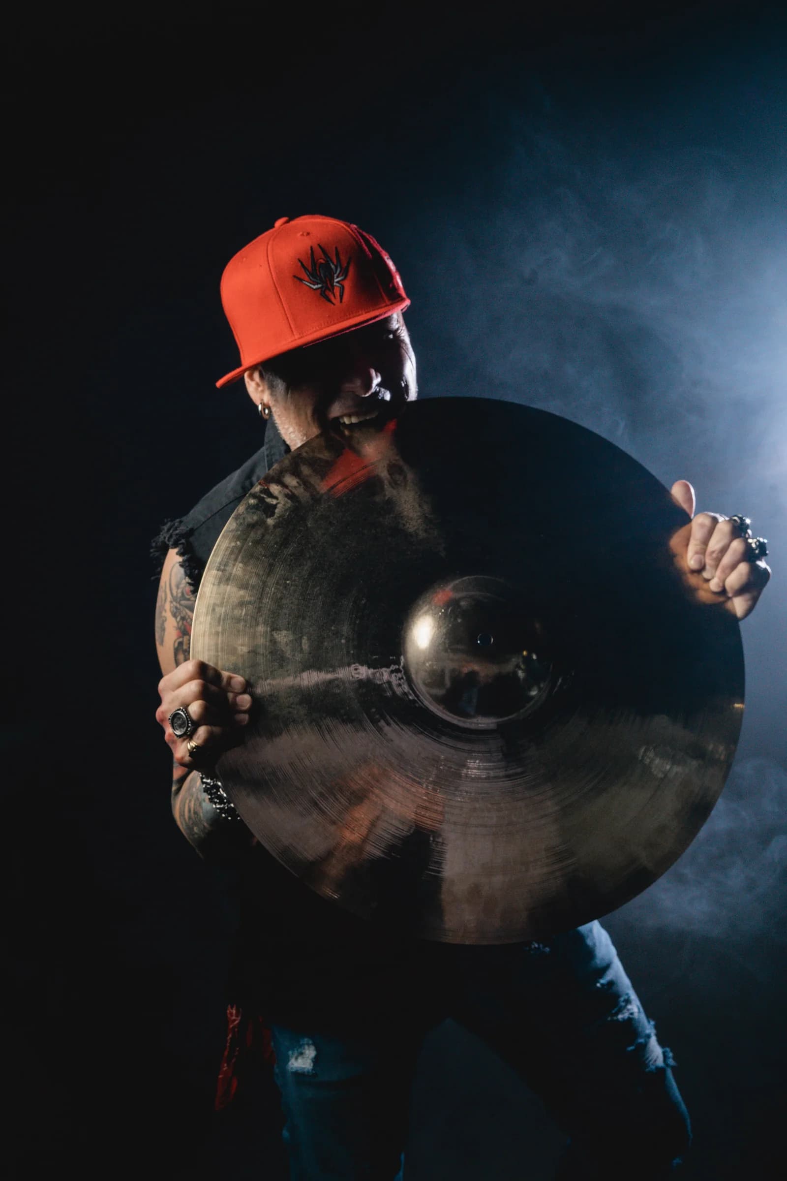 Behind the cymbals