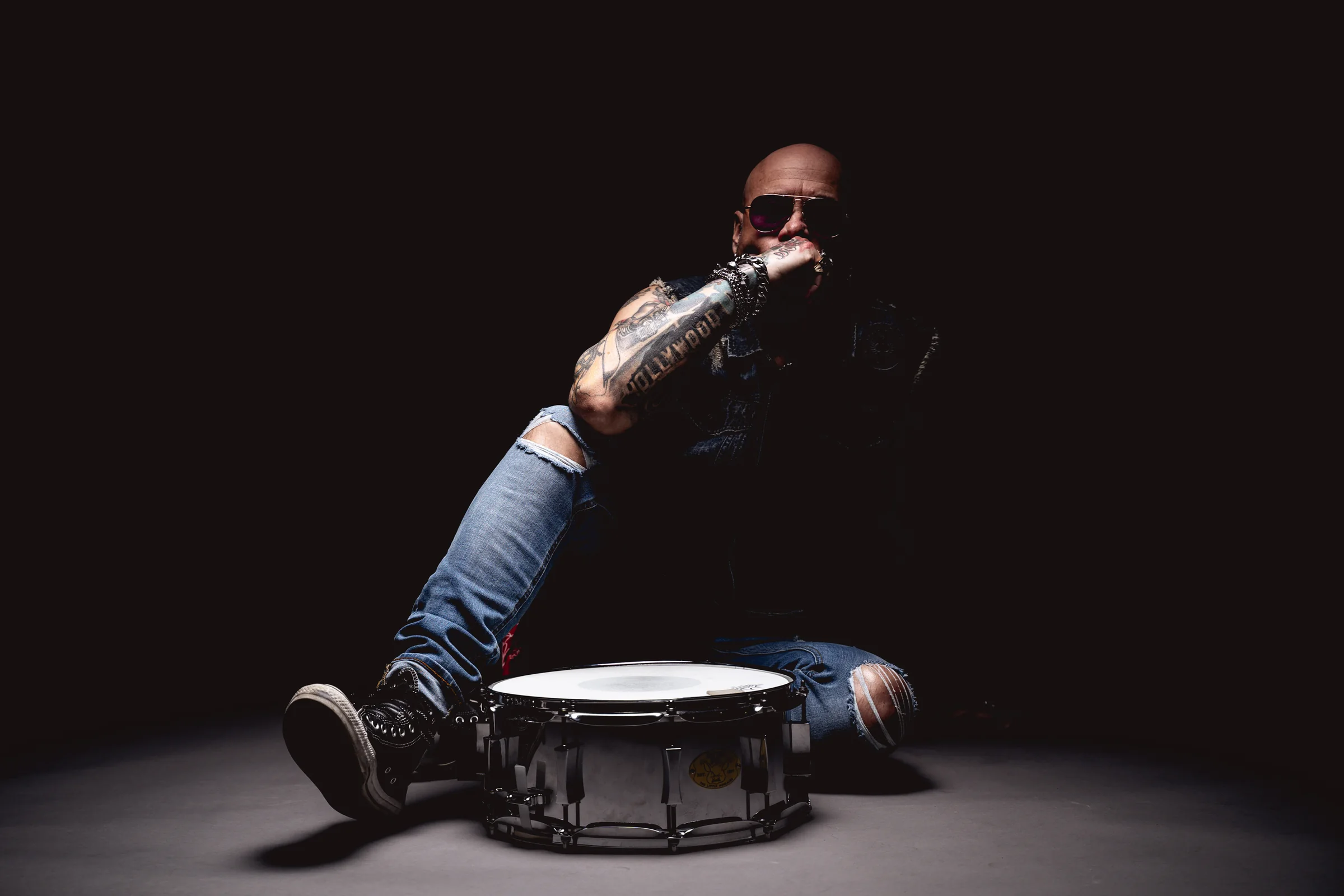 Shane Christopher Neal seated with a snare drum